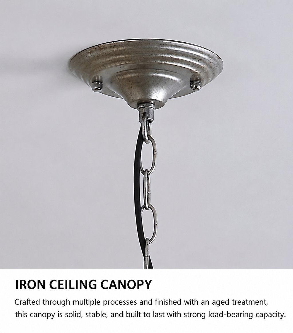 Close-up of the iron ceiling canopy and adjustable chain.