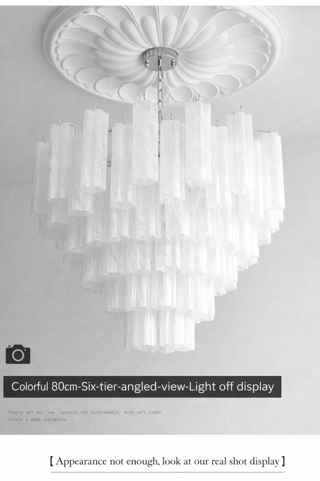 Six-tier ivory glass chandelier shown unlit from an angled view.
