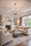 Pastel crystal two-tier chandelier with pink drops in a bright formal living room.